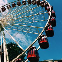 Low angle view of ferris wheel against sky