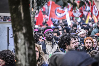 Group of people looking at market