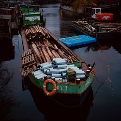 Boats moored at harbor