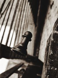 Close-up of metallic structure against wall