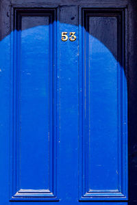 Blue closed door of building