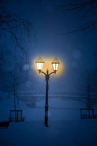 A night scenery of snowy riga - capital of latvia. winter picture of northern europe.