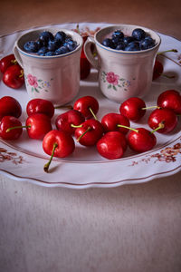 High angle view of strawberries in bowl on table