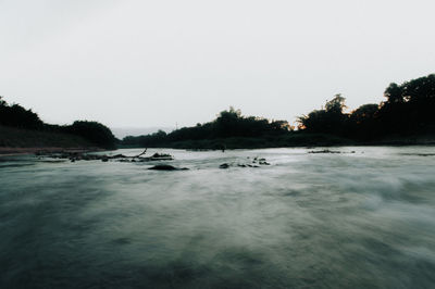 Scenic view of sea against clear sky