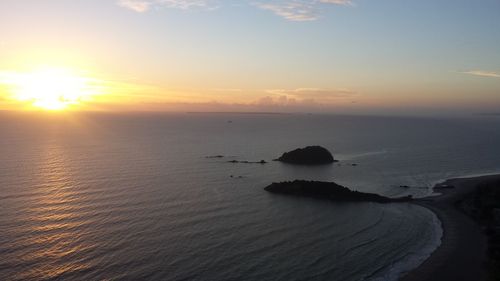 Scenic view of sea at sunset