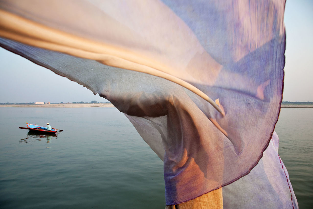 nautical vessel, water, outdoors, sea, real people, nature, men, day, one person, close-up, sky, beauty in nature, people, human body part, human hand, adult, mammal