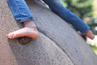 Low section of girl on play equipment
