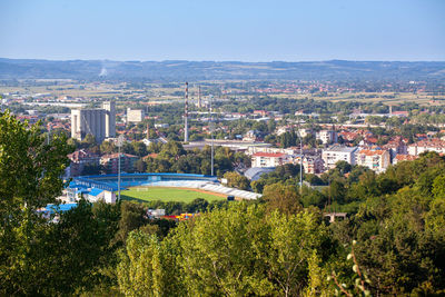 High angle view of buildings against clear sky