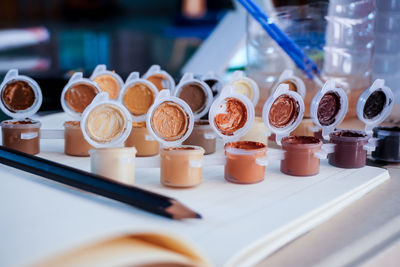 Close-up of coffee cups on table