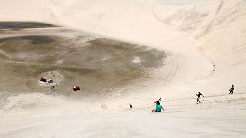 Group of people on snowcapped mountain