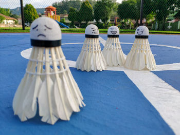 Close-up of sculpture against blue sky