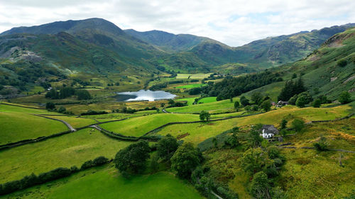 High angle view of landscape and mountains against sky