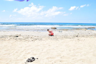 Scenic view of beach against sky