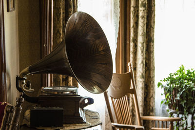 Gramophone on table at home