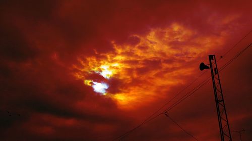 Low angle view of cloudy sky at sunset