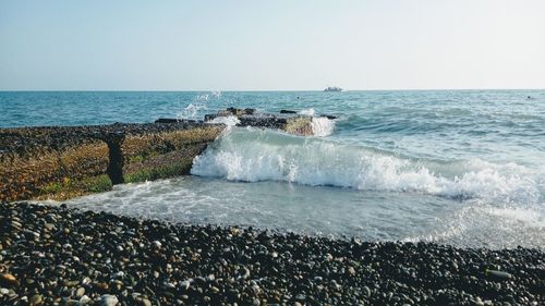 Scenic view of sea against clear sky