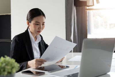 Businesswoman working at office