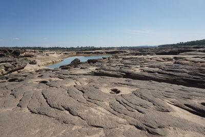 Scenic view of land against sky