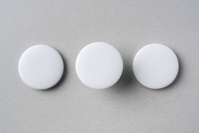 High angle view of white eggs on table