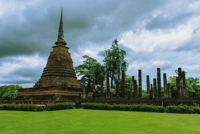 View of temple against cloudy sky