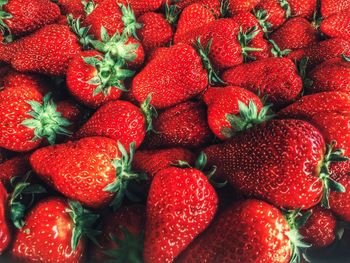 High angle view of strawberries at market stall