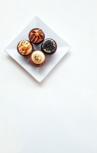 High angle view of cupcakes on plate