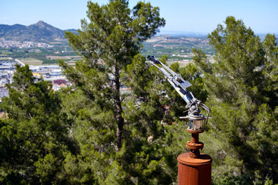 Panoramic shot of trees on mountain against sky