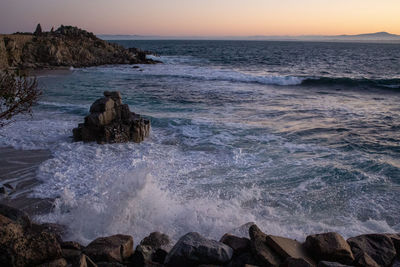 Scenic view of sea against sky during sunset