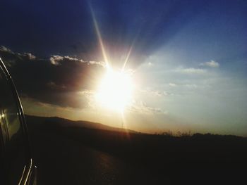 Scenic view of landscape against sky during sunset