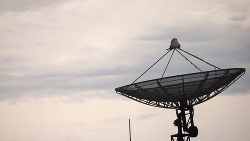 Satellite dish against sky