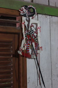 Low angle view of decoration on wall against building