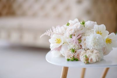 Close-up of white flowers on table