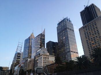 Low angle view of buildings against sky in city