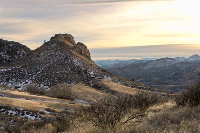 Scenic view of mountains against sky during sunset