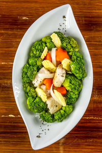 High angle view of salad in bowl on table