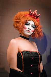 Portrait of young woman in traditional clothing