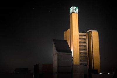 Modern buildings in city at night