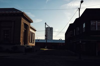 Buildings in city against sky