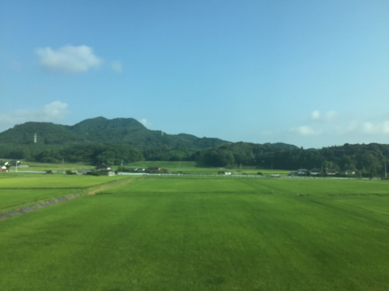 SCENIC VIEW OF GOLF COURSE AGAINST SKY