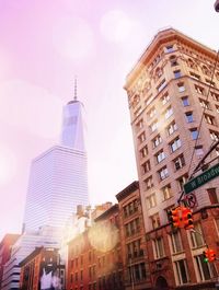 Low angle view of skyscraper against sky