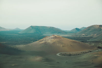 Scenic view of mountains against clear sky