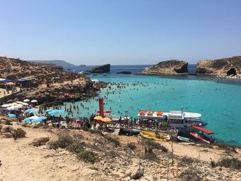 Panoramic view of beach against clear sky