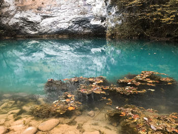 High angle view of rock formation in lake