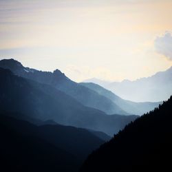 Scenic view of mountains at sunset