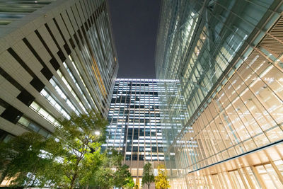 Low angle view of modern buildings in city