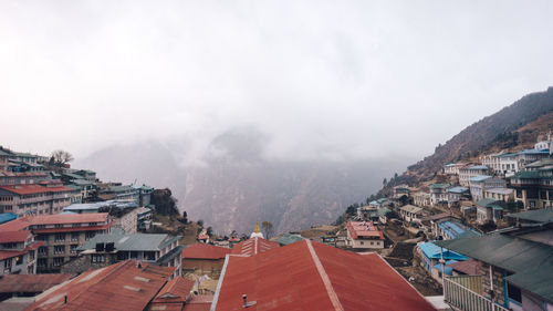 High angle view of townscape during foggy weather