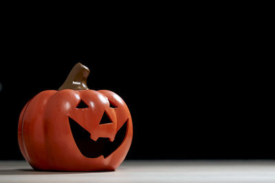 Close-up of pumpkin against black background