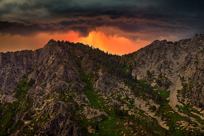 Scenic view of mountains against sky during sunset