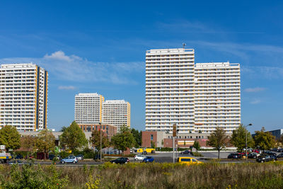 Modern buildings in city against sky