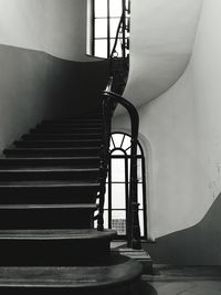 Low angle view of spiral staircase in building